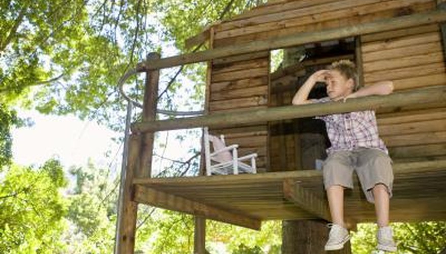 A dumbwaiter helps you take supplies up into a treehouse. A dumbwaiter helps you take supplies up into a treehouse.