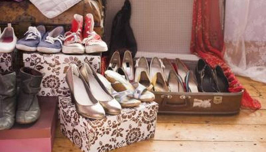 Make way for decorative boxes and vintage luggage to help organize an oddly shaped closet. Make way for decorative boxes and vintage luggage to help organize an oddly shaped closet.