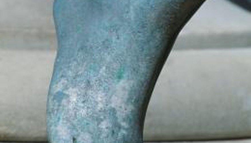 No, it's not an green alien's foot, it's just an oxidixed metal statue with a nice patina. No, it's not an green alien's foot, it's just an oxidixed metal statue with a nice patina.
