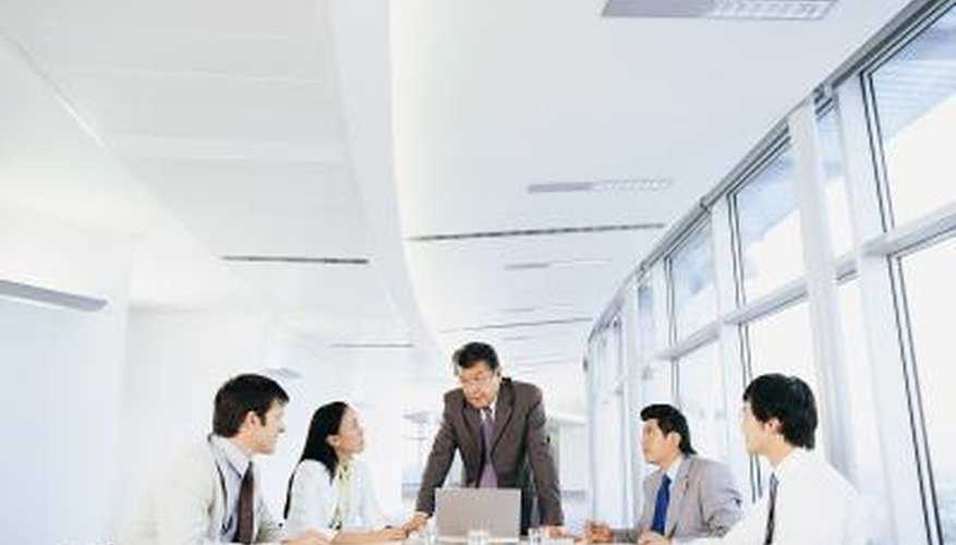 Photo Credit: Digital Vision./Digital Vision/Getty Images Corporate meeting