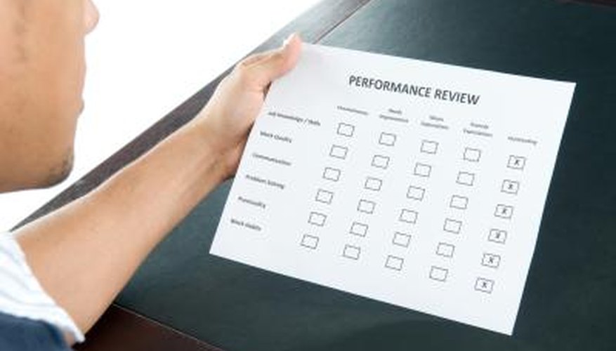 Photo Credit: Josh Rinehults/iStock/Getty Images An employee reviewing an excellent performance review