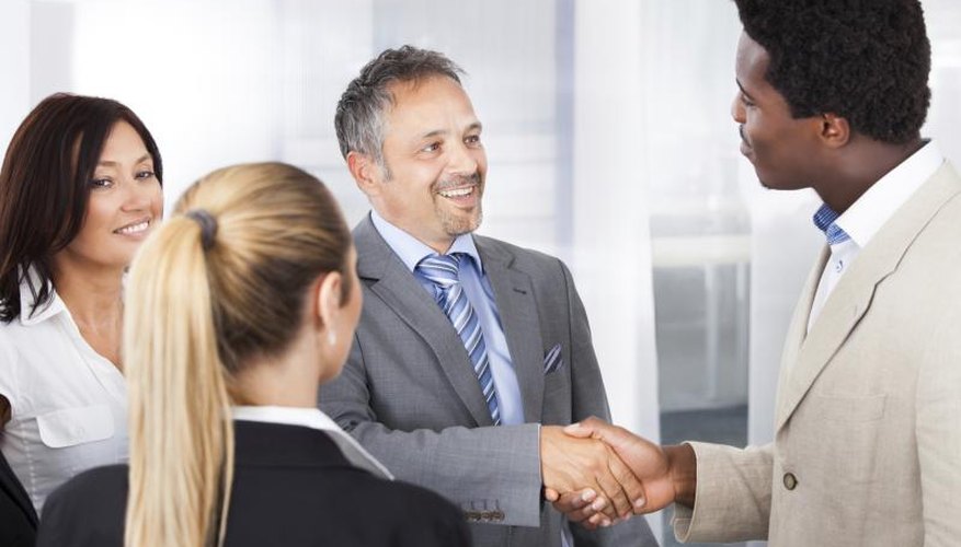 Individuals in a job interview.