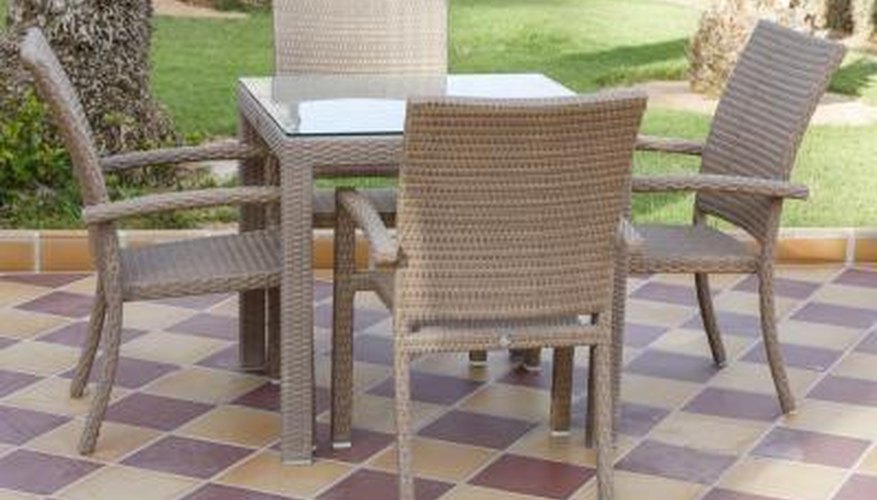 A table for four in an outdoor room with ceramic tile flooring. A table for four in an outdoor room with ceramic tile flooring.