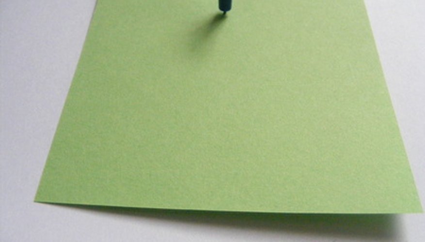 Photo Credit: the green isolated green note image by laviniaparscuta from <a href='http://www.fotolia.com'>Fotolia.com</a> Using recycled paper is a simple way to demonstrate environmental responsibility.