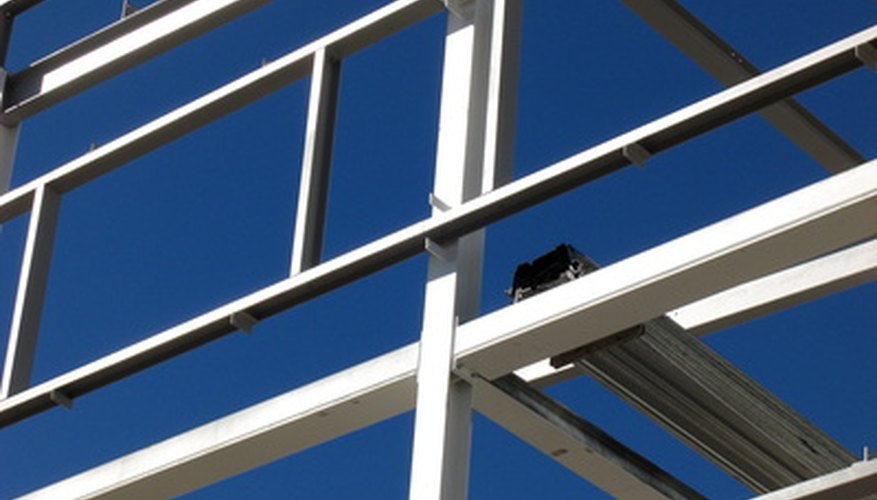 Steel beams can support heavier loads than engineered wood. Steel beams can support heavier loads than engineered wood.