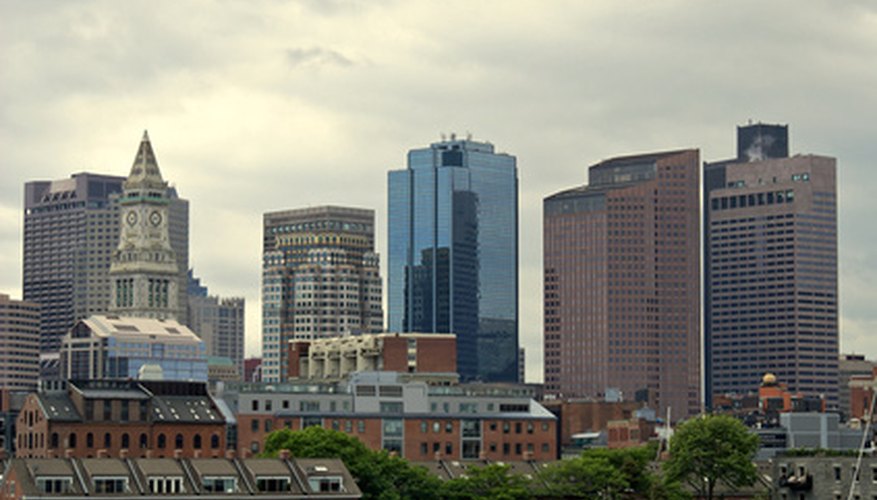 Photo Credit: boston skyline from harbor image by Stephen Orsillo from <a href='http://www.fotolia.com'>Fotolia.com</a> Fleet moved its corporate headquarters to Boston when it merged with BankBoston.