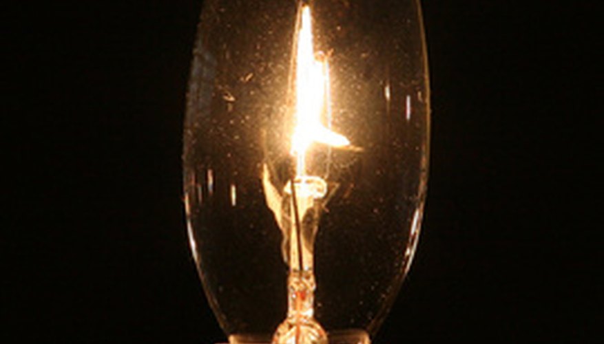 Photo Credit: electric candle image by Ray Kasprzak from <a href='http://www.fotolia.com'>Fotolia.com</a> A glowing filament resistance wire works the same way as a stove element.