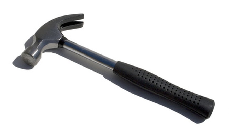 Metal-handled hammers have rubber grips. Metal-handled hammers have rubber grips.