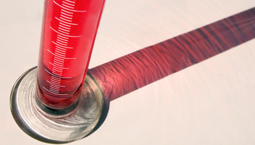Photo Credit: tube image by Radu Razvan from <a href='http://www.fotolia.com'>Fotolia.com</a> Solution with a known volume