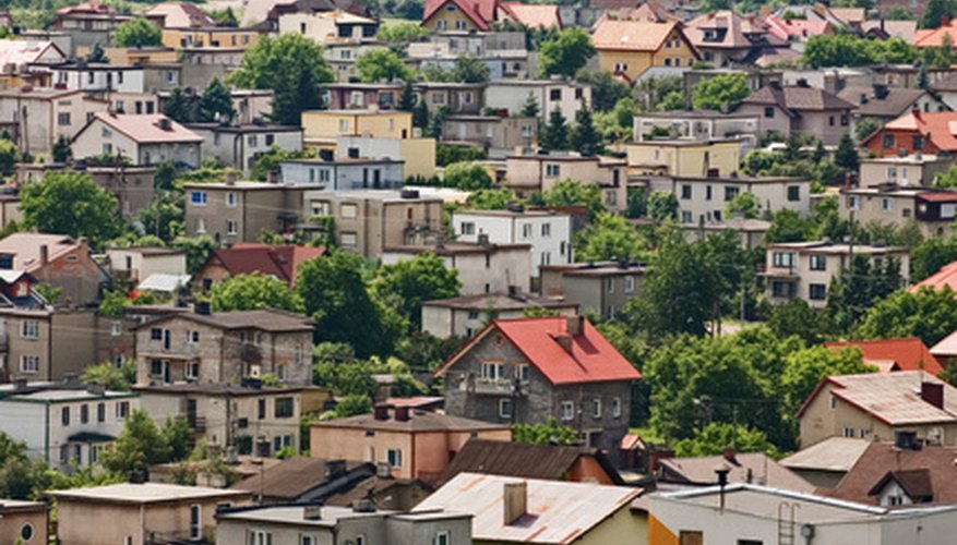 Photo Credit: Populated landscape image by Bartlomiej Nowak from <a href='http://www.fotolia.com'>Fotolia.com</a> Knowing the population growth rate helps plan for future needs.