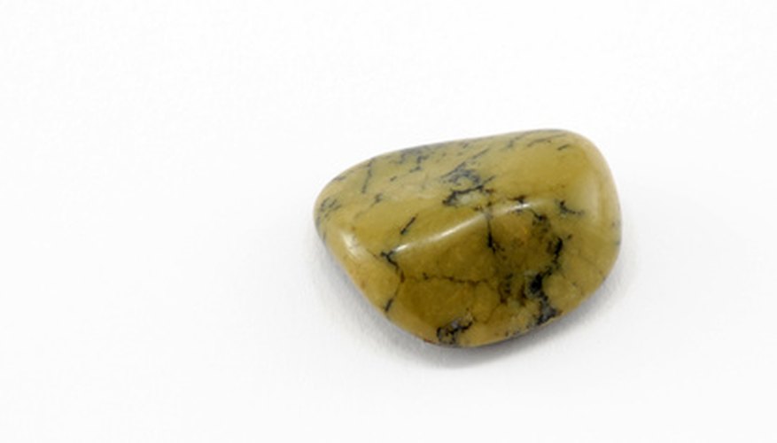 Photo Credit: stone image by Zbigniew Nowak from <a href='http://www.fotolia.com'>Fotolia.com</a> A nicely polished agate, just right for a pendant.