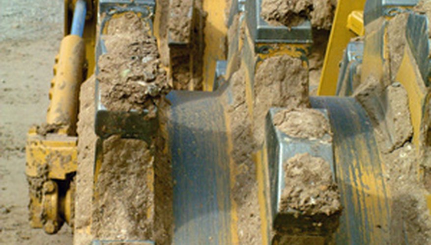 Photo Credit: heavy equipment image by Greg Pickens from <a href='http://www.fotolia.com'>Fotolia.com</a> Choose equipment, materials and suppliers.