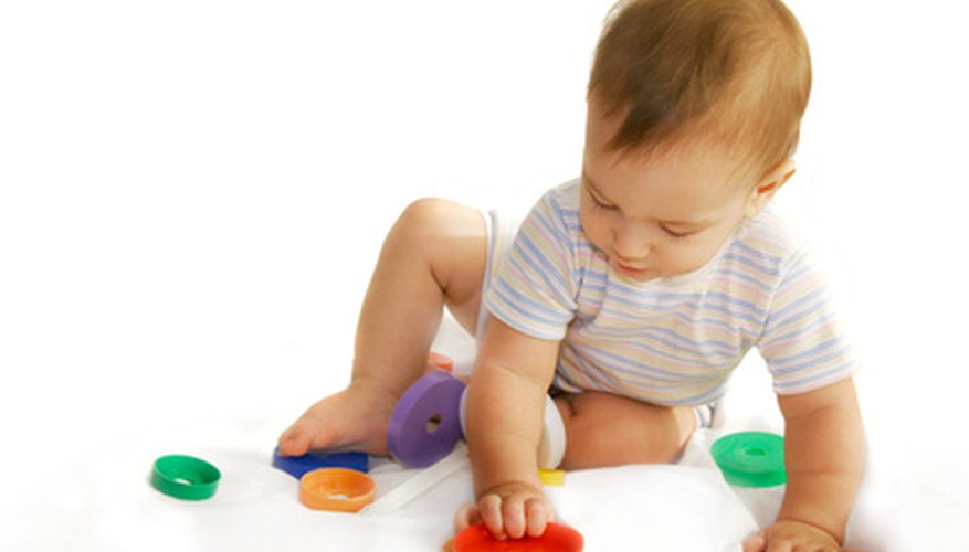 Infants can use toys and objects as a way to better understand their world. Infants can use toys and objects as a way to better understand their world.
