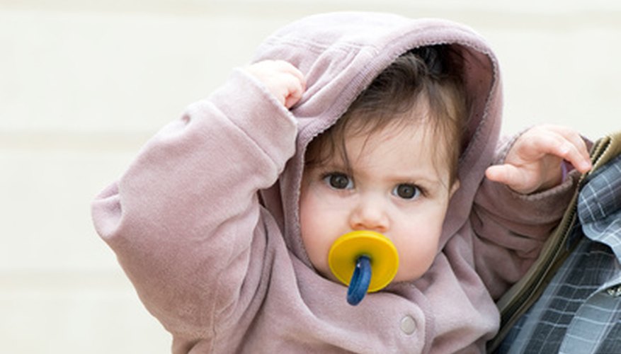 Sterilizing pacifiers helps kill germs that may otherwise end up in your baby's mouth. Sterilizing pacifiers helps kill germs that may otherwise end up in your baby's mouth.