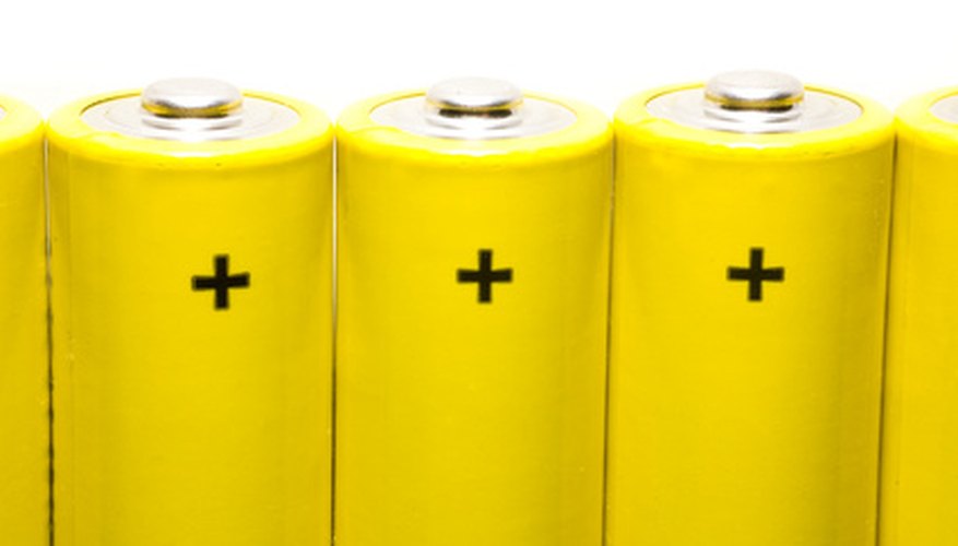Photo Credit: batteries isolated on white background image by Nikolay Okhitin from <a href='http://www.fotolia.com'>Fotolia.com</a> Rechargeable battery packs commonly produce 1.2 volts per cell.