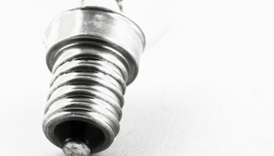 Exposed light bulbs can be dangerous in a damp bathroom. Exposed light bulbs can be dangerous in a damp bathroom.