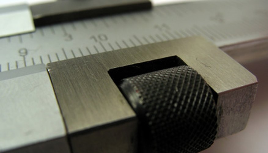 Photo Credit: micrometer image by Stanisa Martinovic from <a href='http://www.fotolia.com'>Fotolia.com</a> With a few simple steps you can convert the gauge number of your steel into its correct thickness.