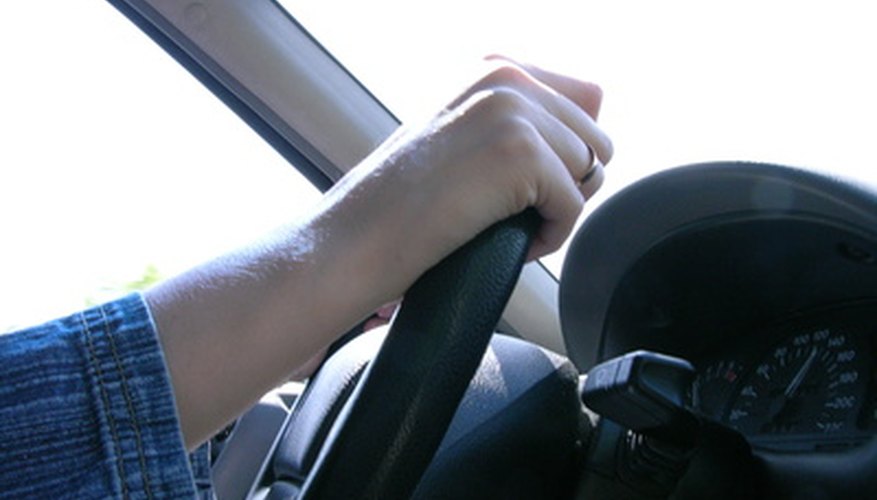 hand on steering whell