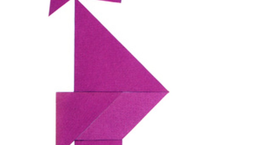 Photo Credit: geisha réalisée avec les 7 pièces d'un tangram image by Unclesam from <a href='http://www.fotolia.com'>Fotolia.com</a> The area of an irregular polygon is calculated mathematically if the coordinates of all its vertices are known.