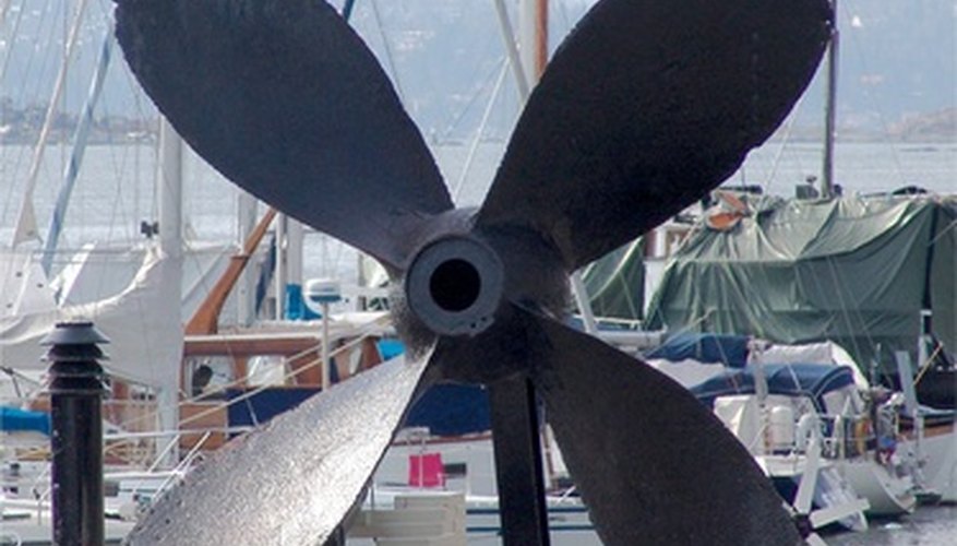 Photo Credit: propeller image by John Sandoy from <a href='http://www.fotolia.com'>Fotolia.com</a> Measuring the taper of a propeller shaft involves calculating its slope ratio.
