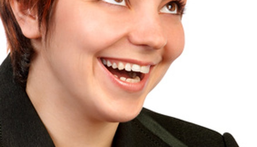Photo Credit: business woman image by Kurhan from <a href='http://www.fotolia.com'>Fotolia.com</a> Moving women into top executive positions is good for business.