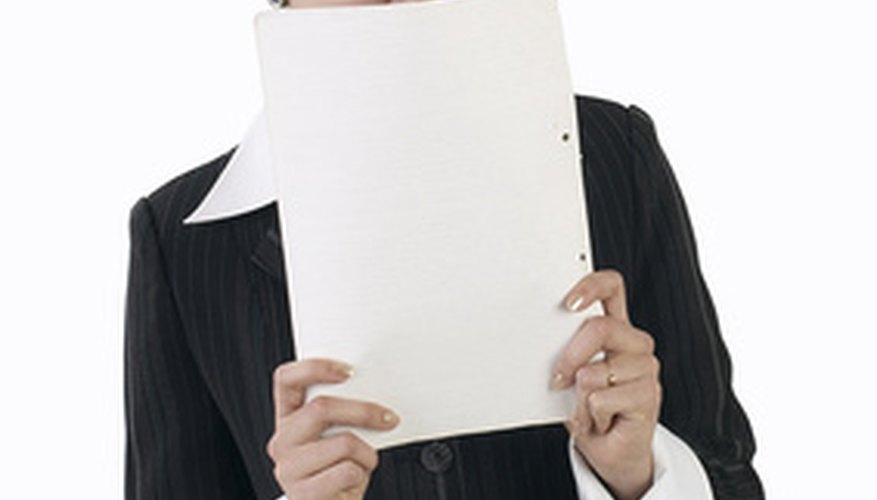Photo Credit: woman with a paper image by AGphotographer from <a href='http://www.fotolia.com'>Fotolia.com</a> A break-even analysis can be quite an eye-opener.