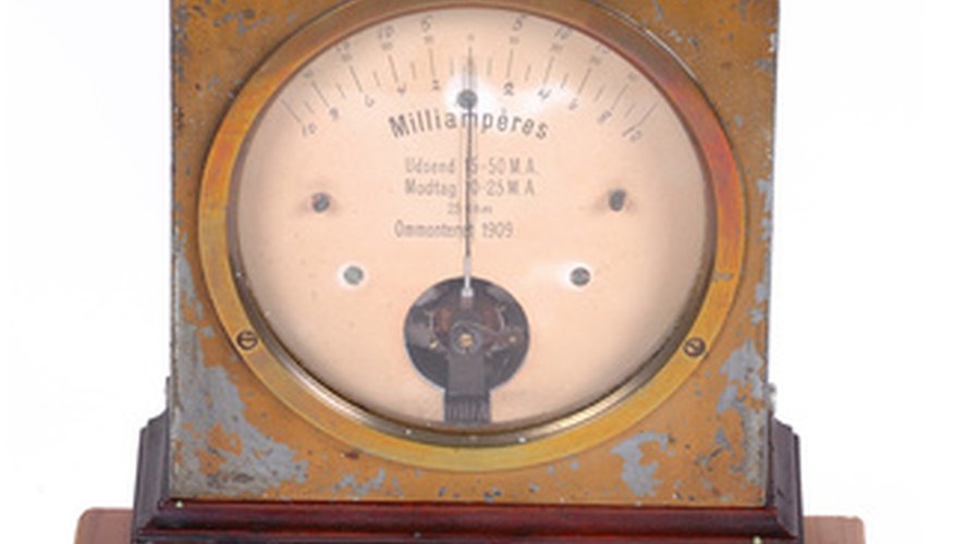 Photo Credit: ampere meter image by Lars Christensen from <a href='http://www.fotolia.com'>Fotolia.com</a> An antique ammeter.