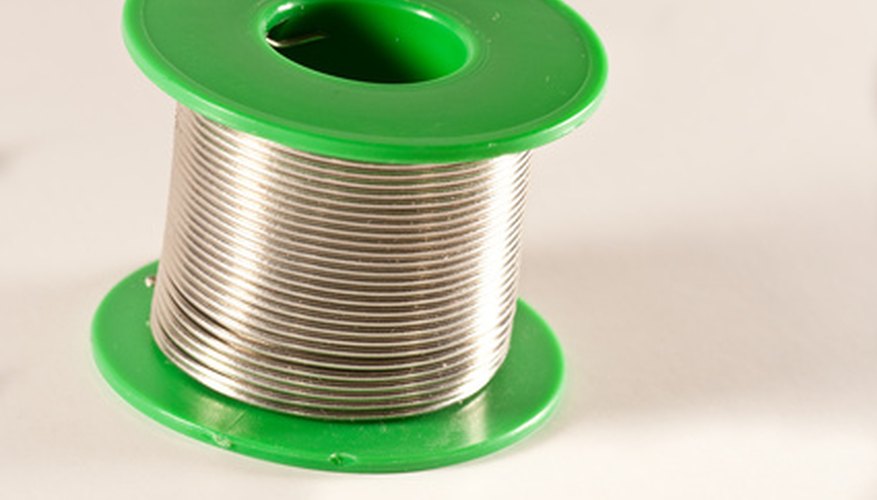 Photo Credit: Solder wire image by naolin from <a href='http://www.fotolia.com'>Fotolia.com</a> A generator relies on a tightly wound spool of wire.
