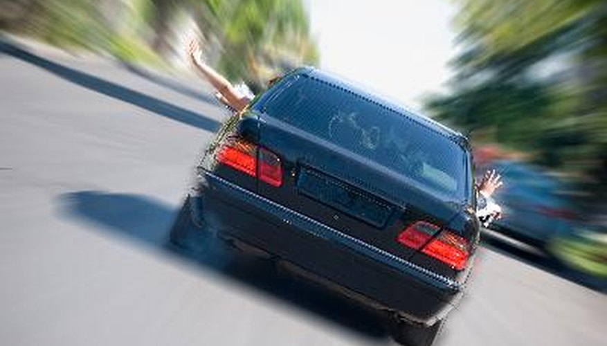 The car with passengers in acceleration