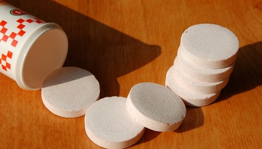 Photo Credit: pills with tube image by kryptajuliett from <a href='http://www.fotolia.com'>Fotolia.com</a> A circle's area determines its cylinder's volume.