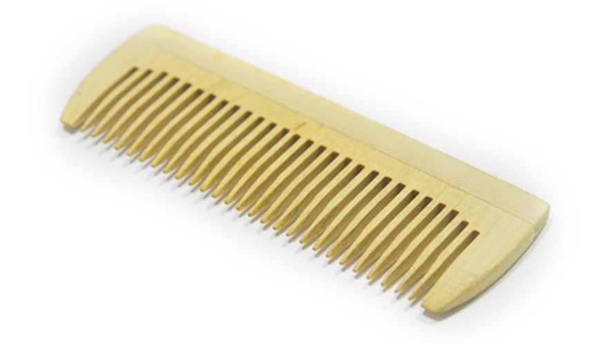 A wide-toothed comb helps fill out the repaired area by blending the fibers. A wide-toothed comb helps fill out the repaired area by blending the fibers.