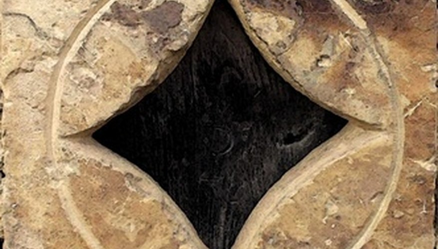 Photo Credit: rombo image by VÃctor Pablo Galván from <a href='http://www.fotolia.com'>Fotolia.com</a> An inscribed square's four corners touch the circle drawn around it.