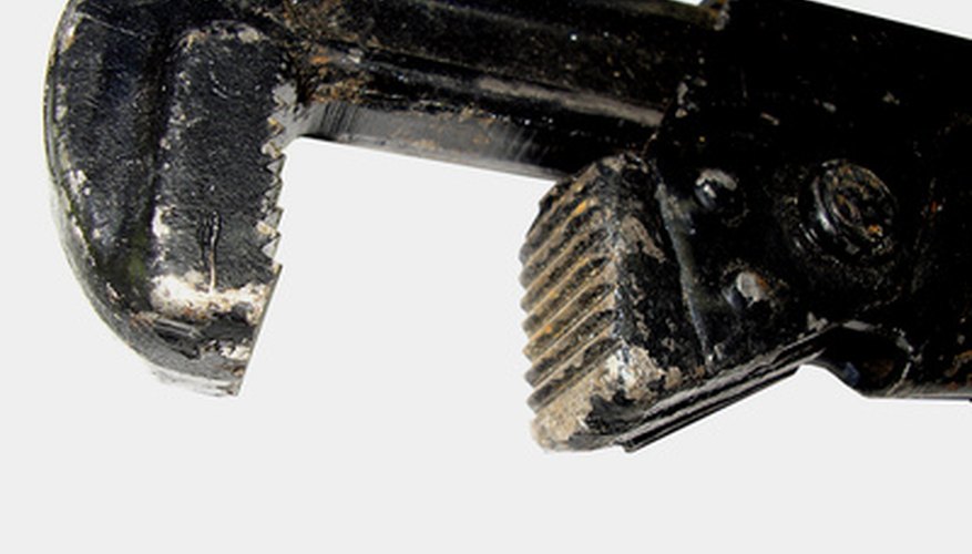 The pipe wrench's jaws expand to a greater width than adjustable wrenches. The pipe wrench's jaws expand to a greater width than adjustable wrenches.