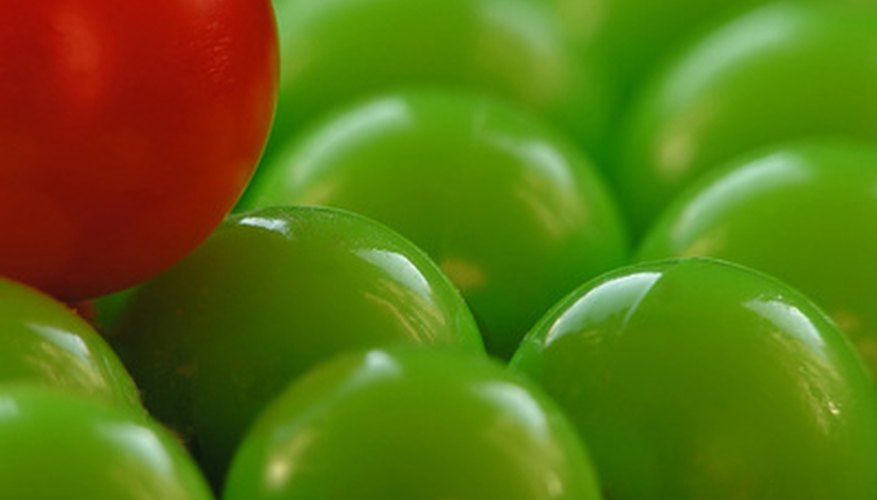 Photo Credit: red and green image by saied shahinkiya from <a href='http://www.fotolia.com'>Fotolia.com</a> People who are colorblind may be unable to distinguish between the colors of the balls in this picture.
