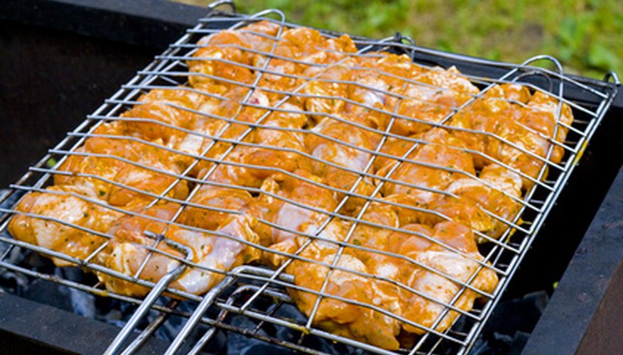 Photo Credit: Appetizing Barbecue on the grill image by Andris Daugovich from <a href='http://www.fotolia.com'>Fotolia.com</a> Gas grills using LP represent its most familiar use.