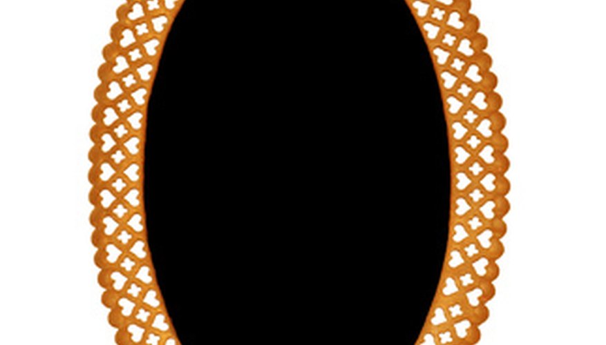 Photo Credit: abstractbackground image by Nirdesha Munasinghe from <a href='http://www.fotolia.com'>Fotolia.com</a> This bauble is in the shape of an ellipse.