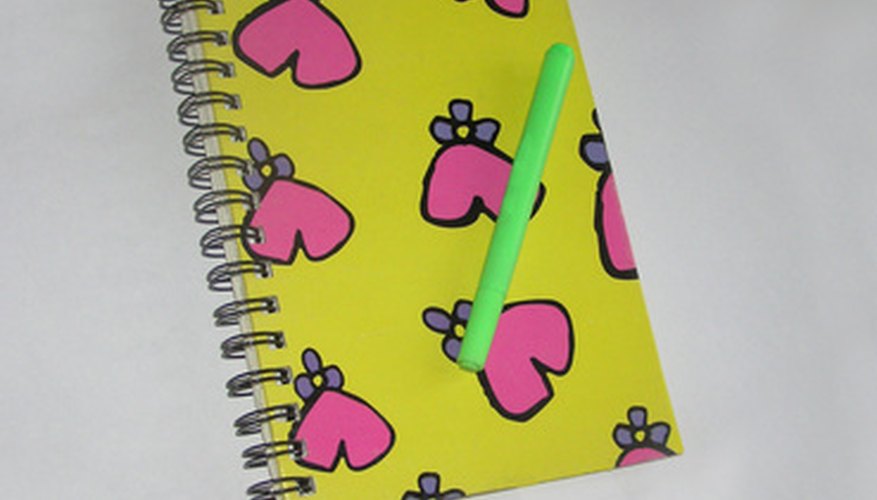 Photo Credit: notebook with hearts 2 image by Olga Chernetskaya from <a href='http://www.fotolia.com'>Fotolia.com</a> Novelty notebooks are designed to appeal to the consumer's every need.