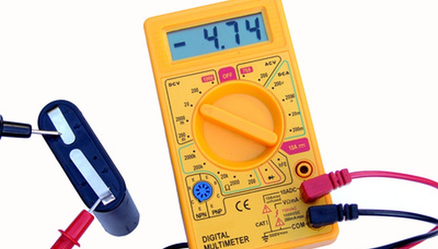 Photo Credit: voltage image by Tadzio from <a href='http://www.fotolia.com'>Fotolia.com</a> A modern volt ohm meter
