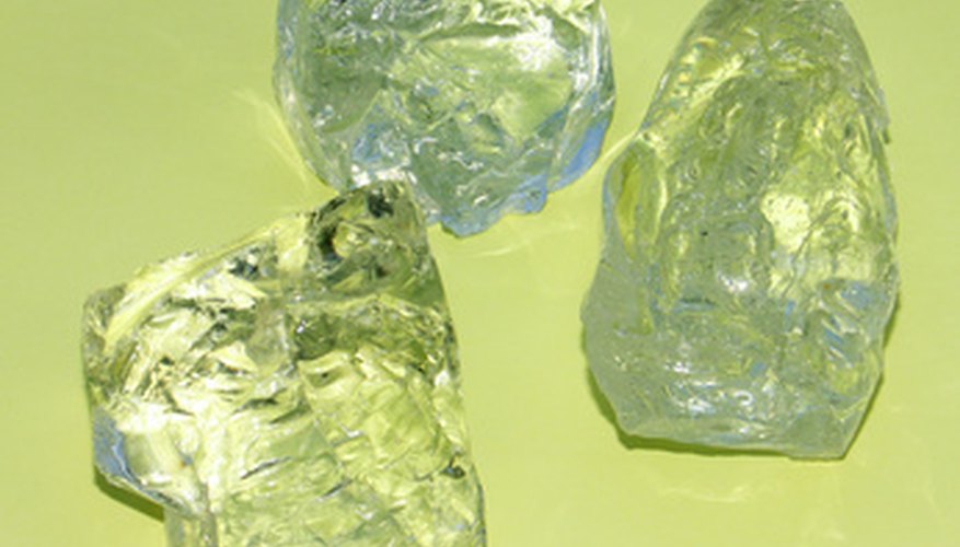 Photo Credit: quartz sur fond jaune pastel image by Unclesam from <a href='http://www.fotolia.com'>Fotolia.com</a> Telling a Herkimer diamond from ordinary quartz can be a rocky process.