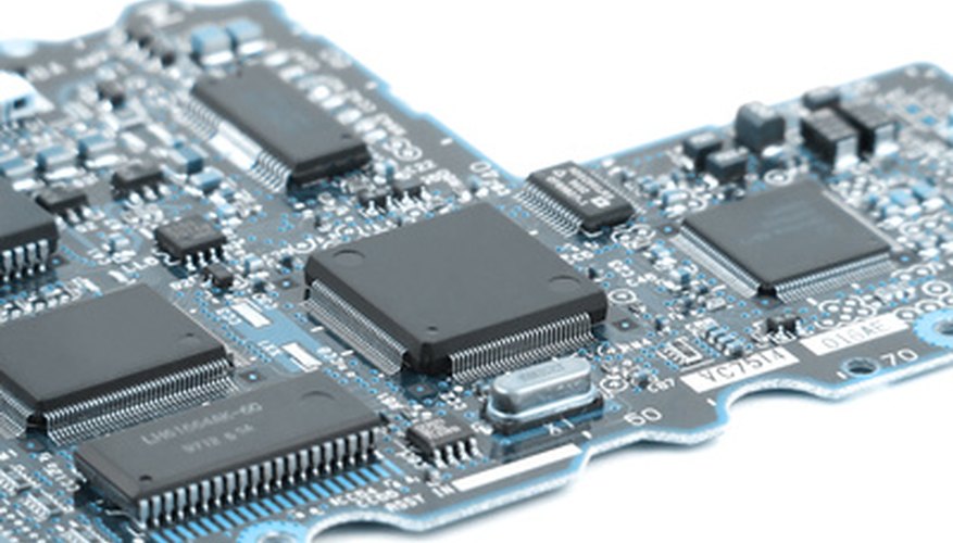 Photo Credit: computer circuit board image by glamoroso from <a href='http://www.fotolia.com'>Fotolia.com</a> Circuit breakers protect sensitive electronics from shorts.