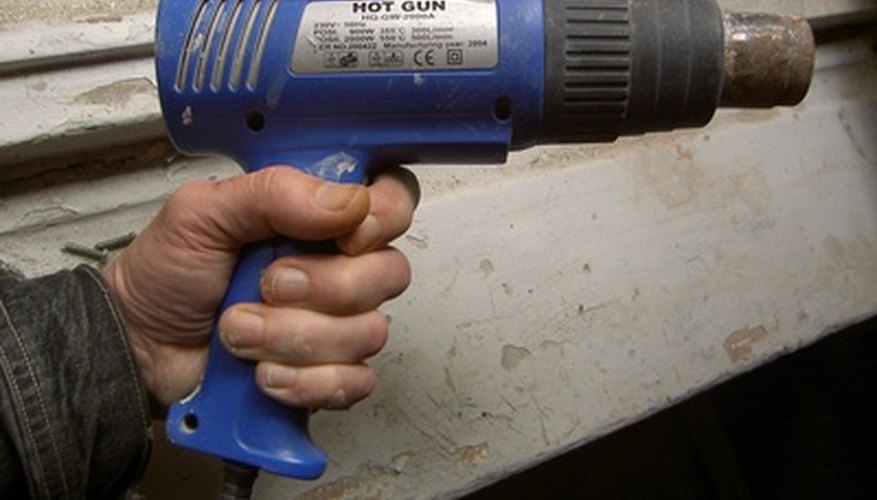 Photo Credit: hot gun in hand image by Gintautas Velykis from <a href='http://www.fotolia.com'>Fotolia.com</a> Hot guns and hair dryers also use resistance filament elements.