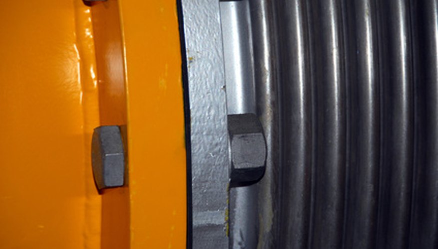Photo Credit: Abstract of compressed air pipework image by Heng kong Chen from <a href='http://www.fotolia.com'>Fotolia.com</a> View of a compressed air piping system.