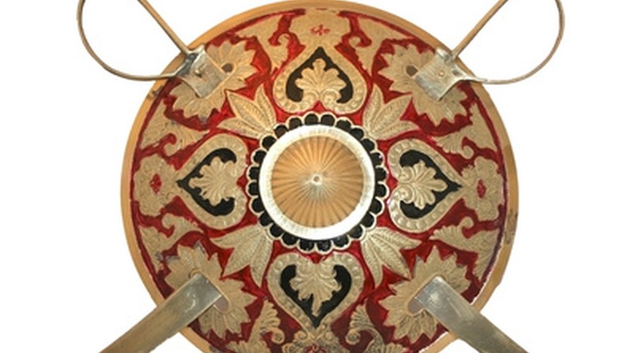 It's easy to make a Greek shield from cardboard. It's easy to make a Greek shield from cardboard.