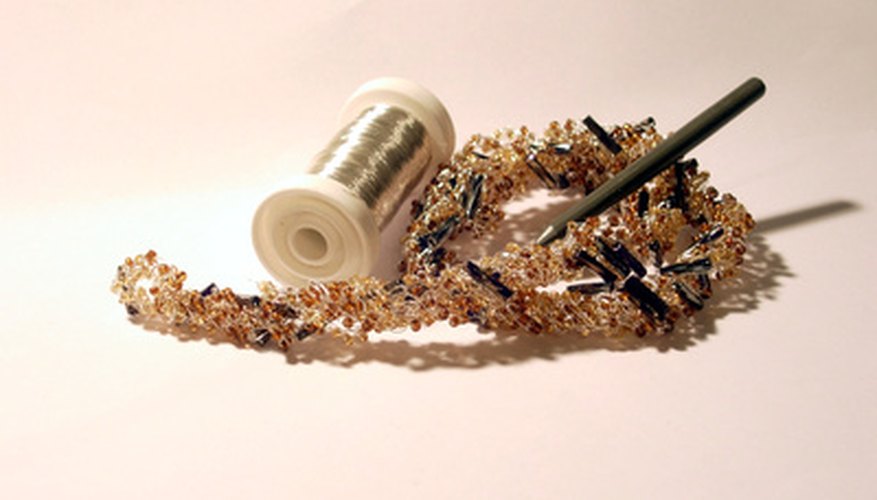 Photo Credit: handworks 3 image by stassad from <a href='http://www.fotolia.com'>Fotolia.com</a> Craft wire, used to string jewelry, makes the energy levels for the potassium atom model.