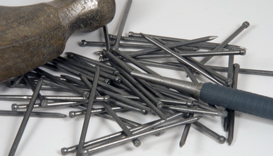 Finishing nails are designed to disappear into the surface of wood. Finishing nails are designed to disappear into the surface of wood.