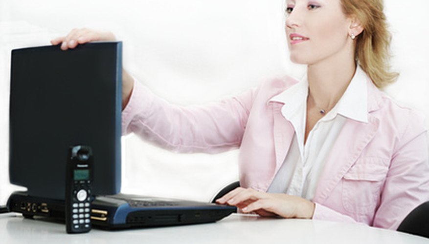 Photo Credit: woman working on a laptop computer image by Julia Britvich from <a href='http://www.fotolia.com'>Fotolia.com</a> Glass walls obstruct women and minorites seeking a learn various facets of the business.