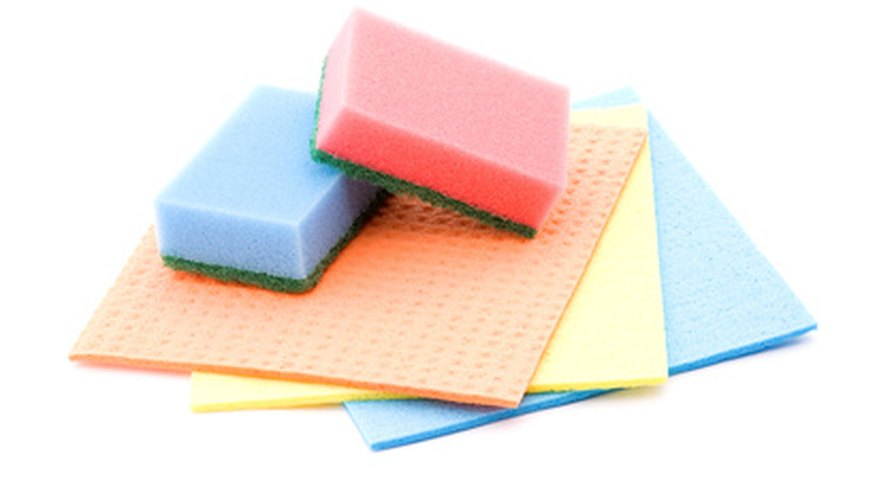 Dab at the stain with warm, soapy water. Dab at the stain with warm, soapy water.
