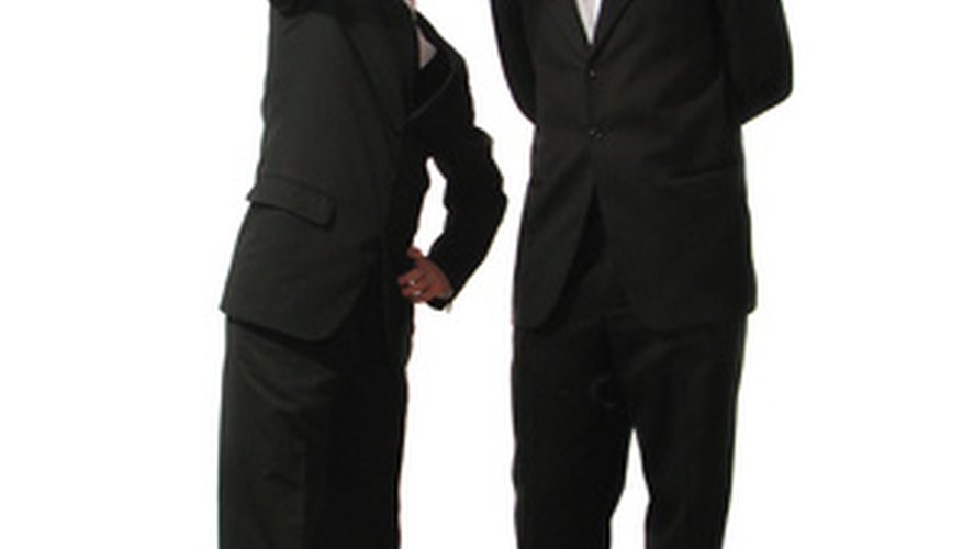 Photo Credit: builder and the project manager image by Dmitri MIkitenko from <a href='http://www.fotolia.com'>Fotolia.com</a>