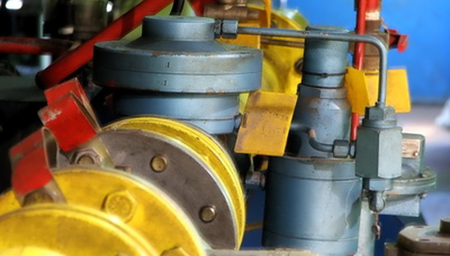 Photo Credit: pipe line image by Dusan Radivojevic from <a href='http://www.fotolia.com'>Fotolia.com</a> A hydraulic system has many physical calculations working in concert.