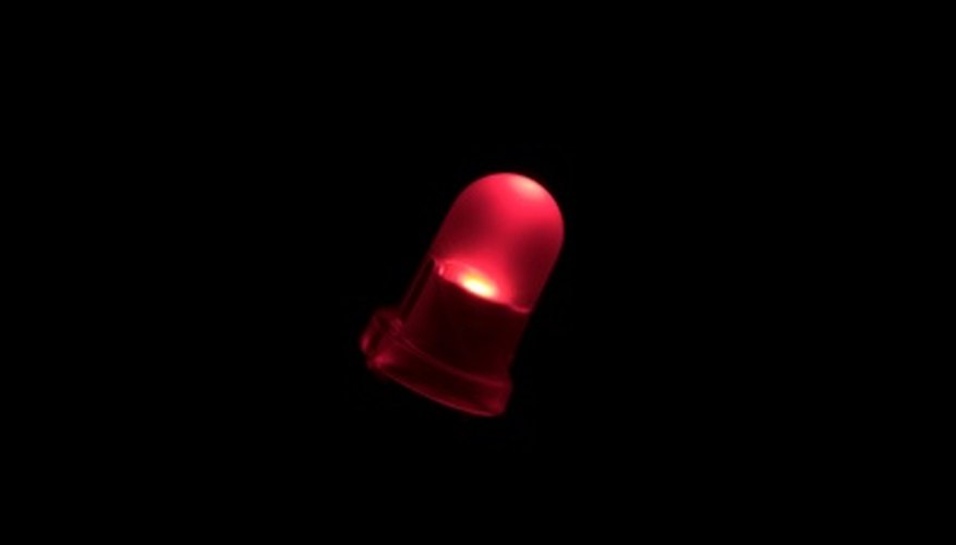 Photo Credit: red glow led image by Kir from <a href='http://www.fotolia.com'>Fotolia.com</a> LED's can be used with higher voltages by using a resistor wired in series.